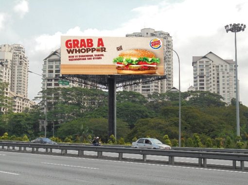 Triple-sided billboard at Damansara Toll on the NKVE